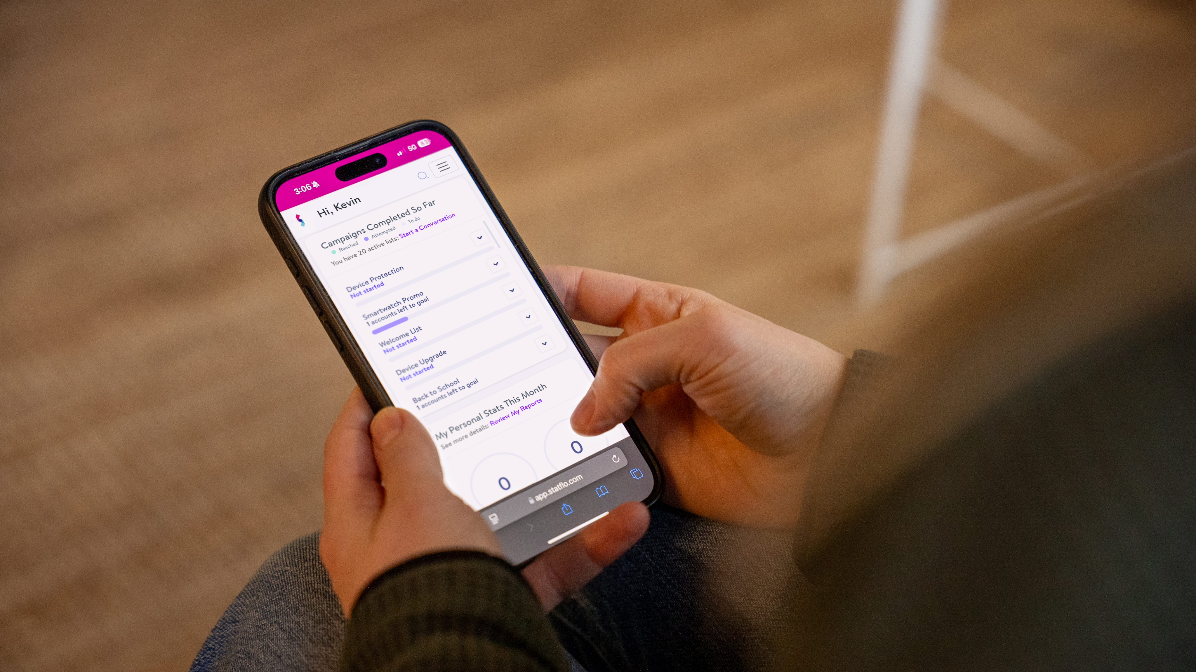 Person sitting by window working on tablet